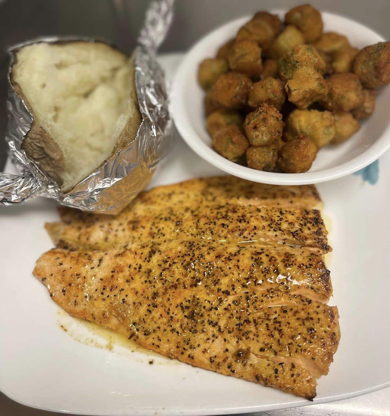 Grilled Atlantic salmon fillet with herbs